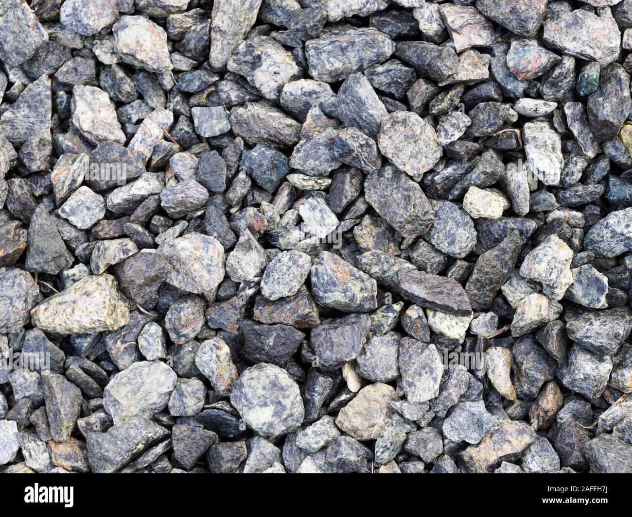 Background from gray small stones. Caucasus Stock Photo