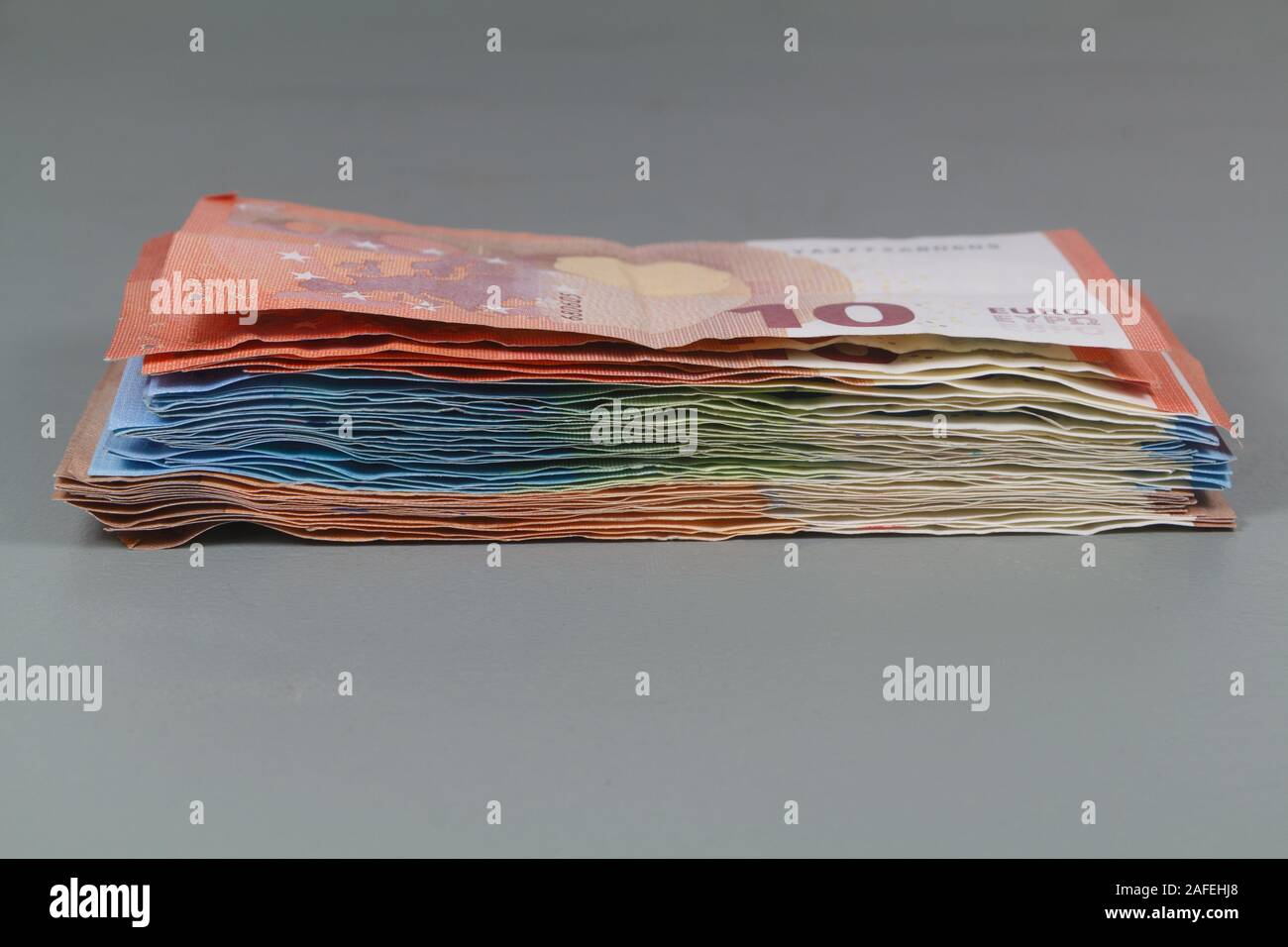 Heap of banknotes of ten, twenty and fifty euros Stock Photo