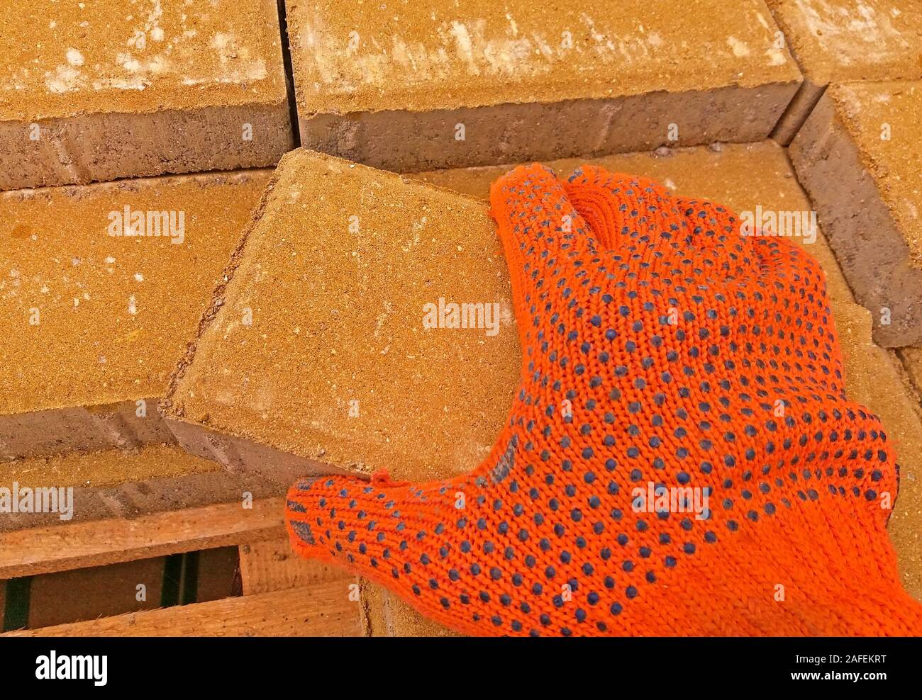 Worker is working on installing the pavement Stock Photo