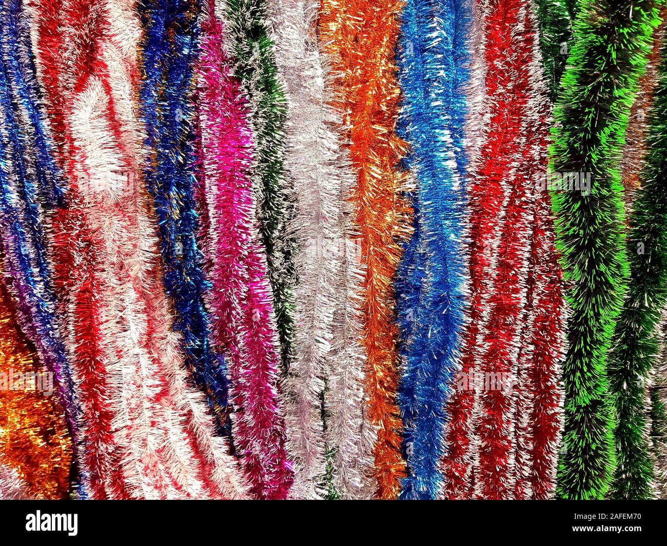 New Year Christmas tinsel texture multicolored Stock Photo Alamy