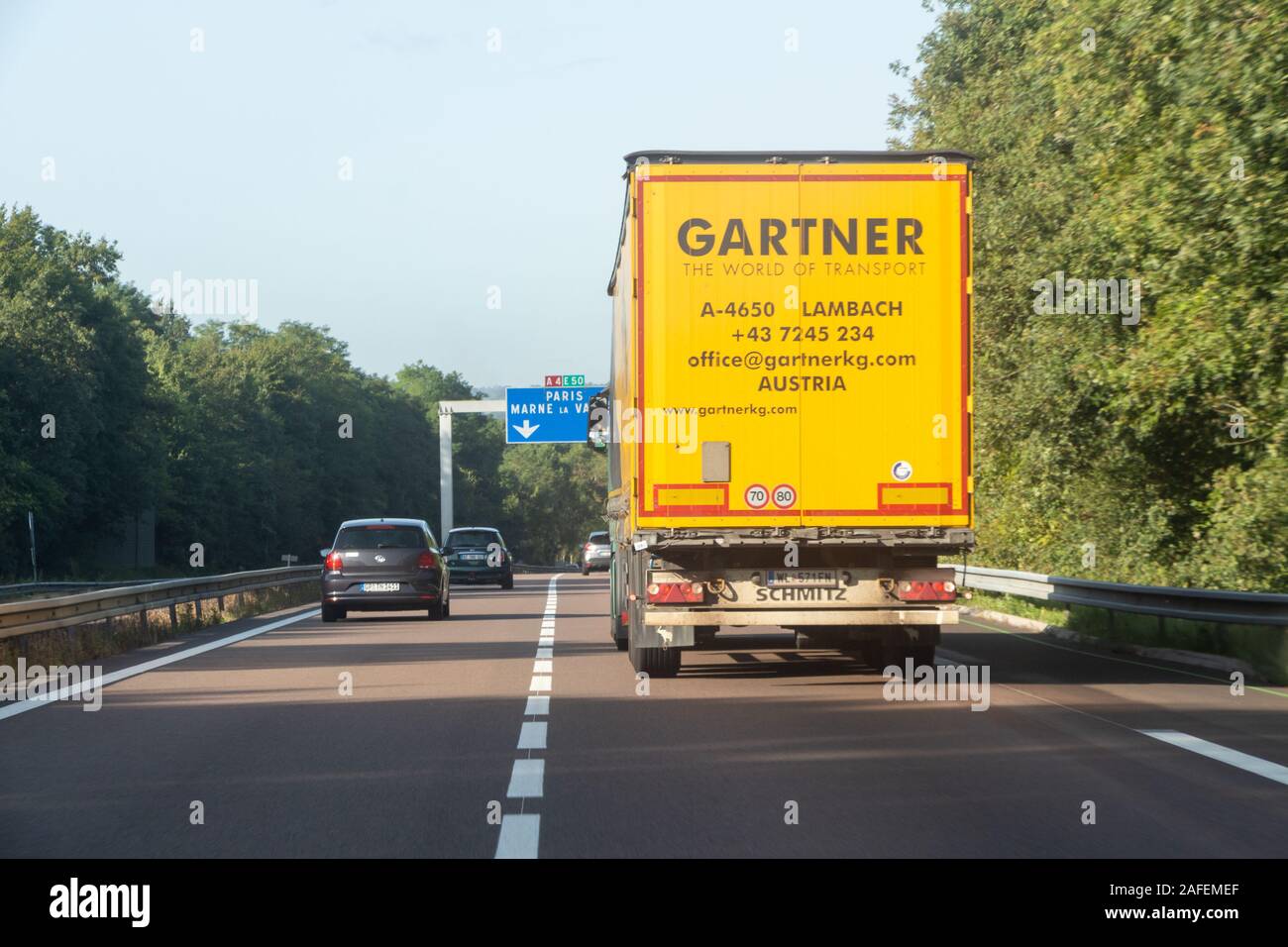 Melun – France, August 19, 2019 : Cars and Gartner truck on the highway Stock Photo