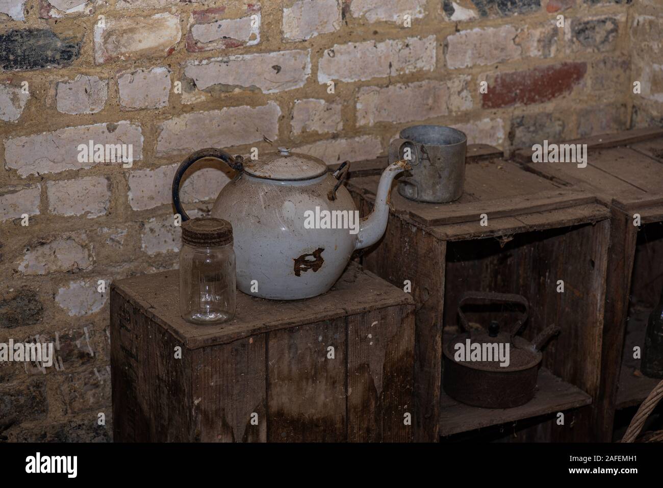 antique kettles in an old kitchen Stock Photo