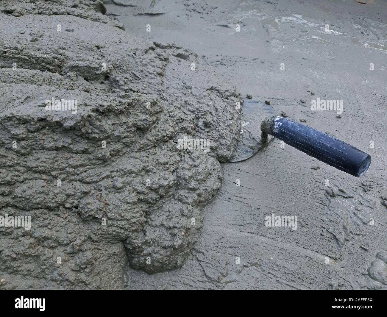 Trowel and mortar for plastering. Construction concept Stock Photo