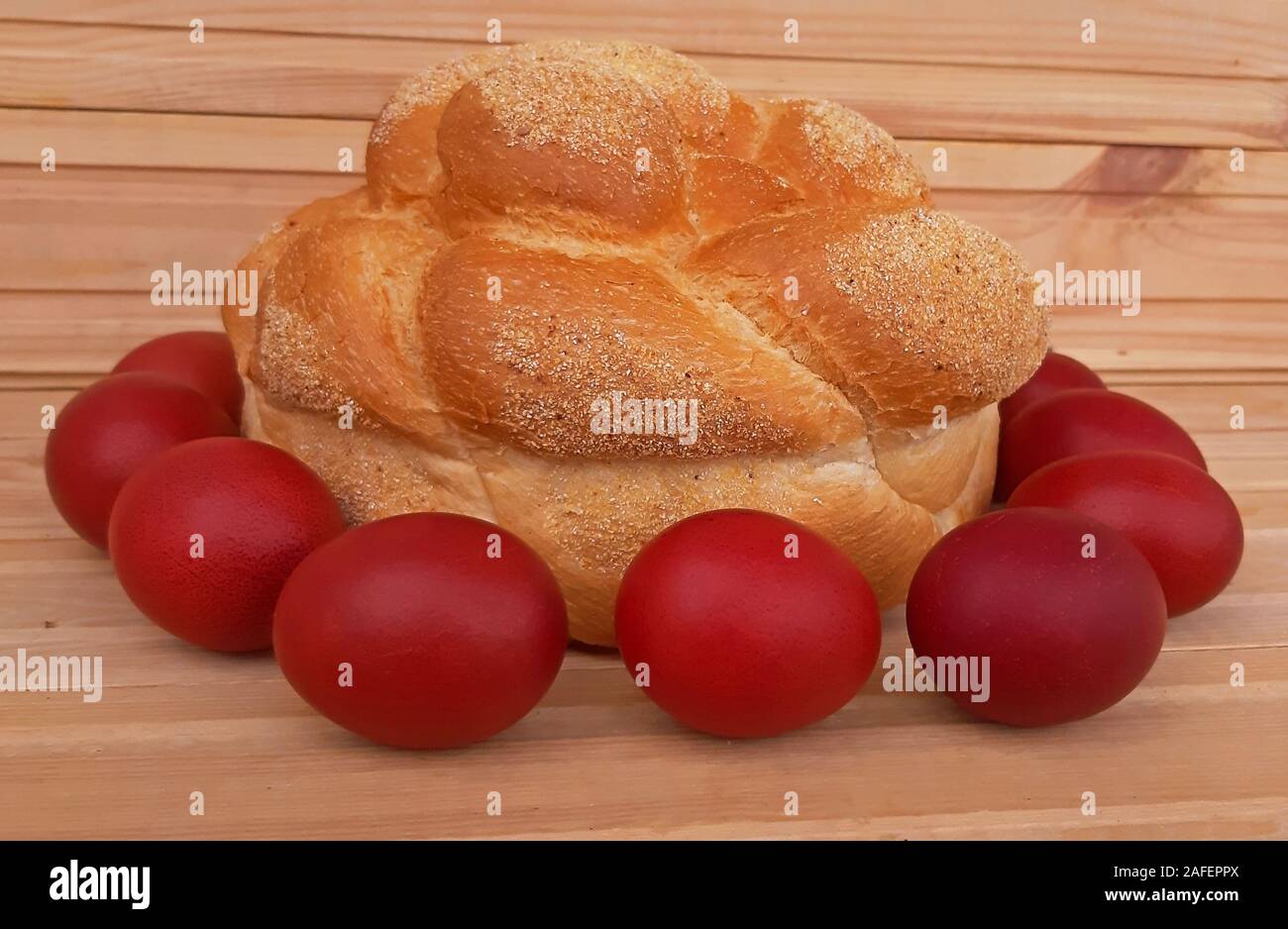 Easter red eggs and homemade bread. Easter concept Stock Photo
