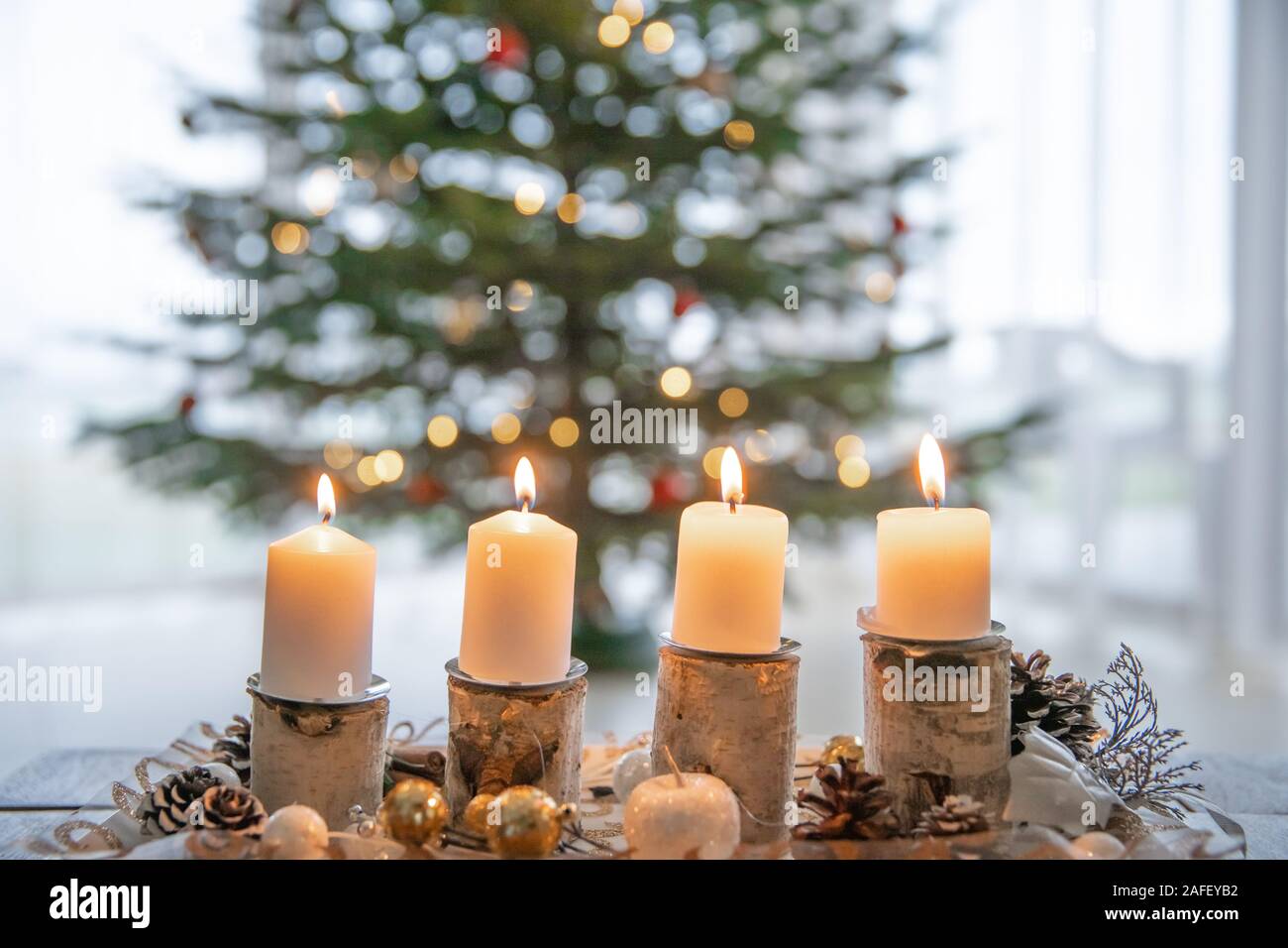 The candles on the Advent wreath are lit every Sunday according to