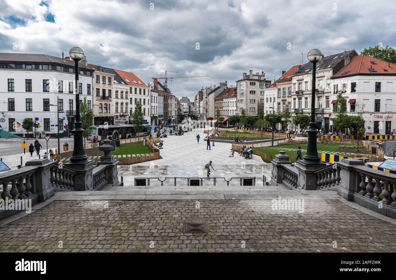 Ixelles, Brussels / Belgium - 05 31 2019: People walking at the new renovated pedestrian zone around Fernand Cocq Square in front of the town hall Stock Photo