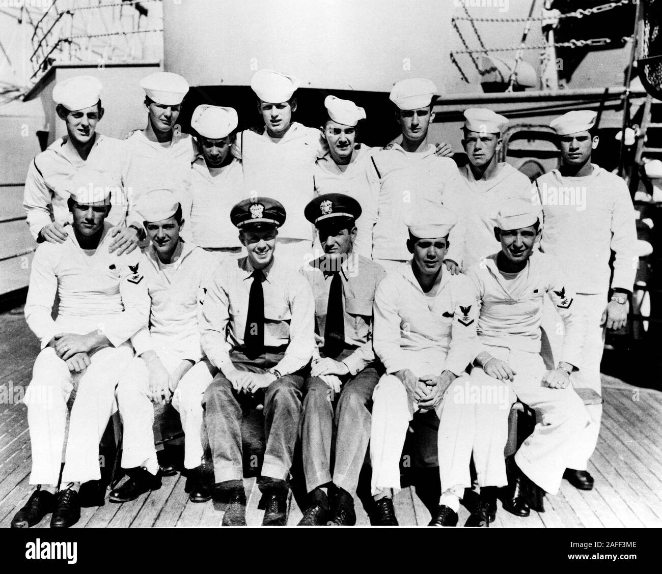 June 1947 - USA - JIMMY CARTER, C-L front row with Commander hat, smiles with the 'O' Division crew, on the Deck of USS Wyoming Ship. (Credit Image: © Keystone Press Agency/Keystone USA via ZUMAPRESS.com) Stock Photo