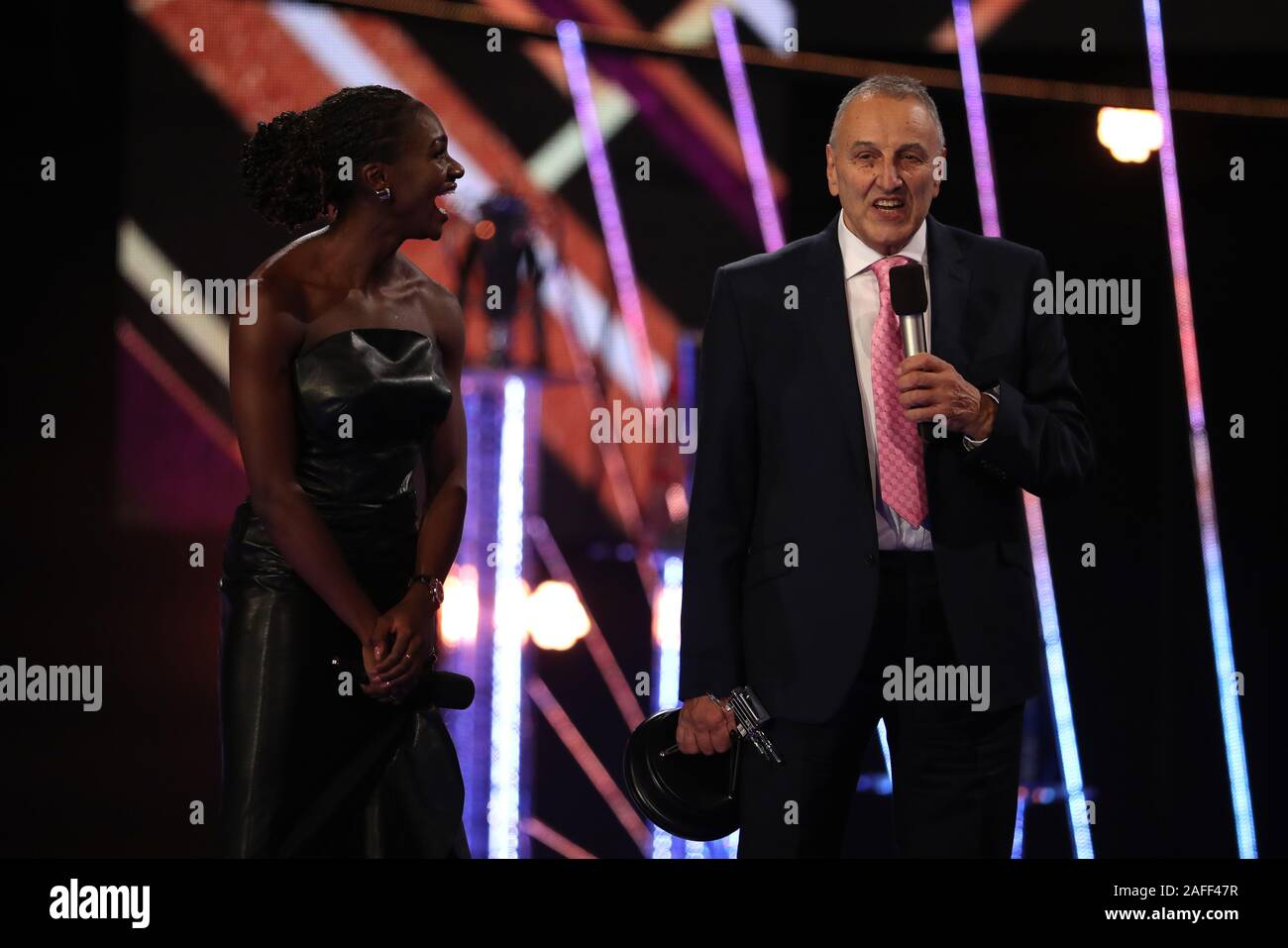 John Blackie (right) with his Coach of the Year Award alongside Dina Asher Smith during the BBC Sports Personality of the Year 2019 at The P&J Live, Aberdeen. Stock Photo