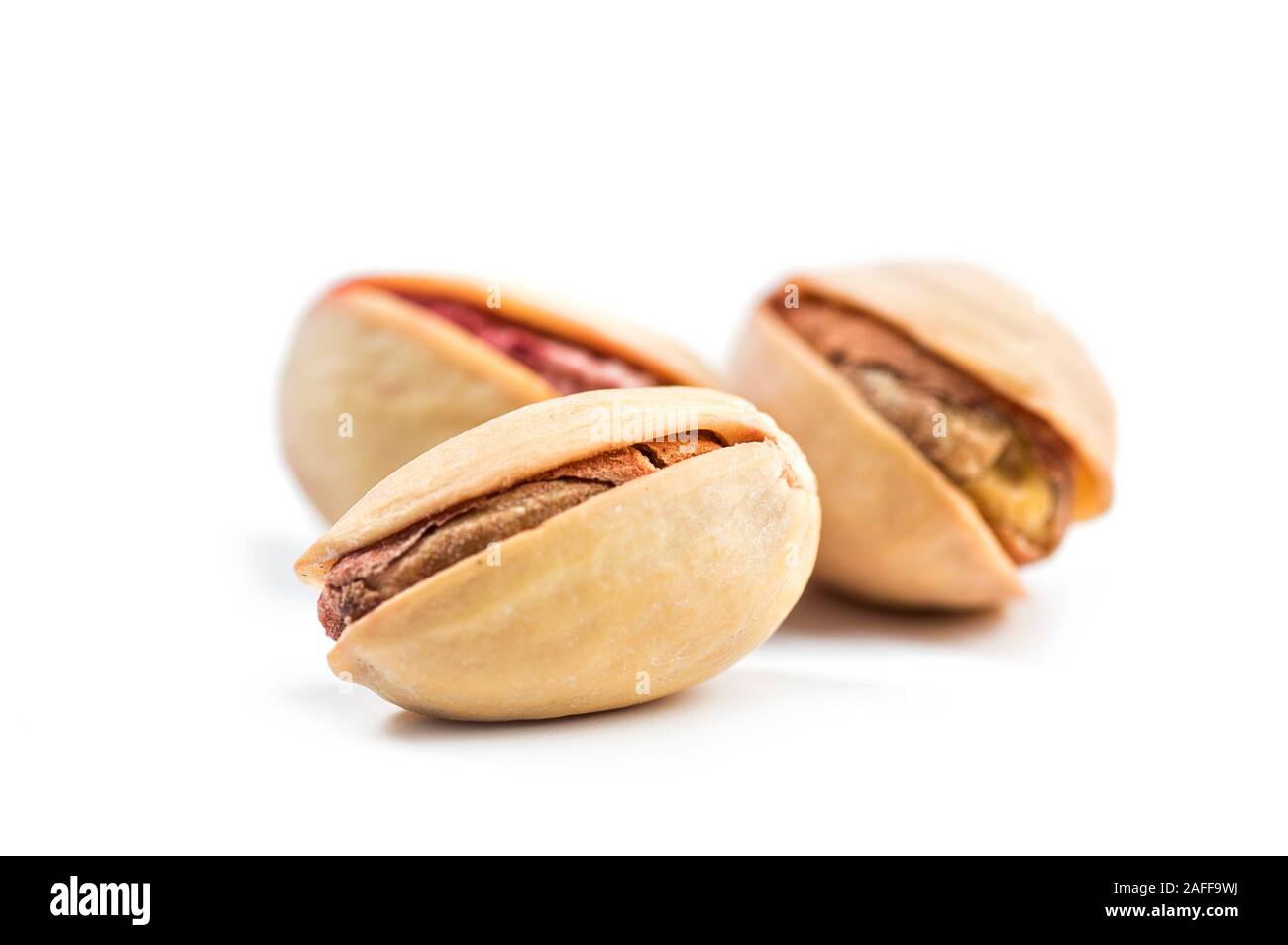 Pistachio on a white background Stock Photo - Alamy