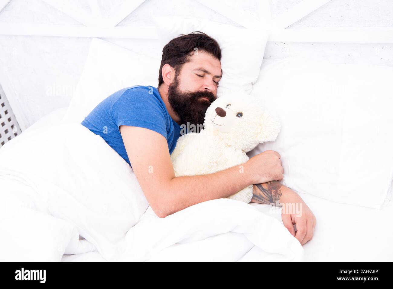 spend weekend in bed. feel cosy at home. good night and sweet dreams.  bearded man teddy bear in bed. plush toy concept. present for you. happy  birthday. Love and kindness. time go, image size:1300x955