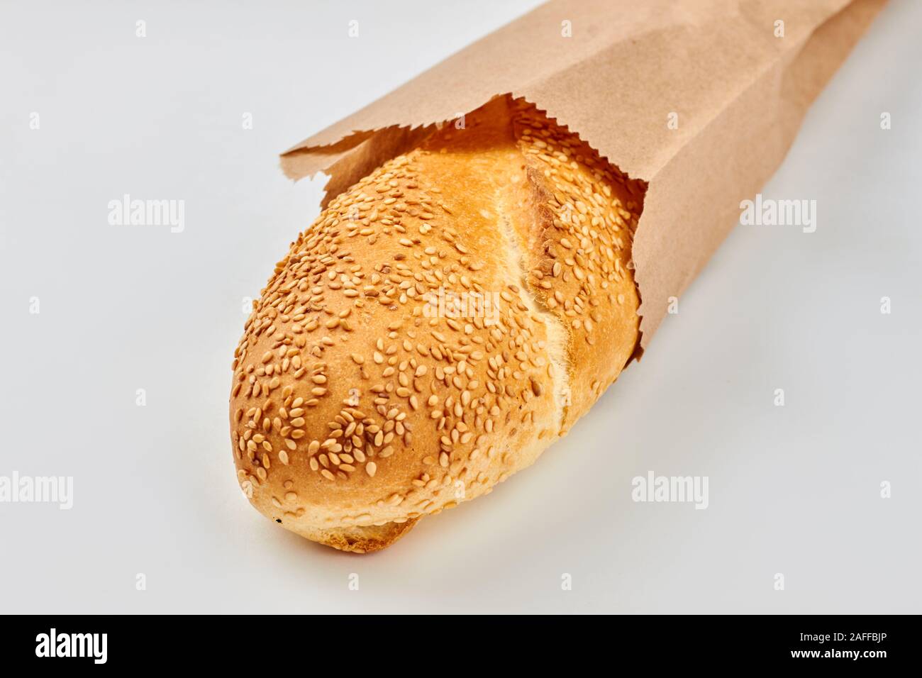 French bread in kraft bag. Stock Photo