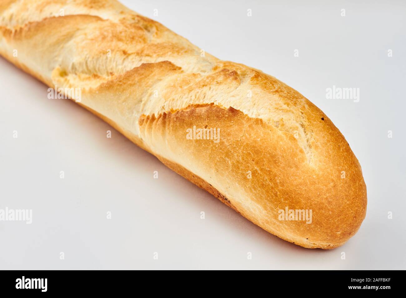 French baguette isolated on white background Stock Photo - Alamy