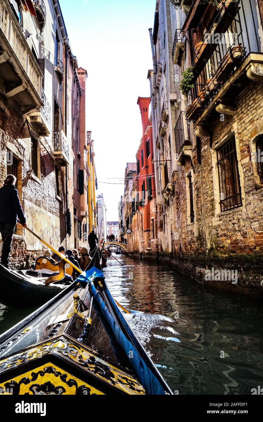Gondolas are part of the venetian culture. Being a gondolier is more of a privilege rather than a job. Stock Photo