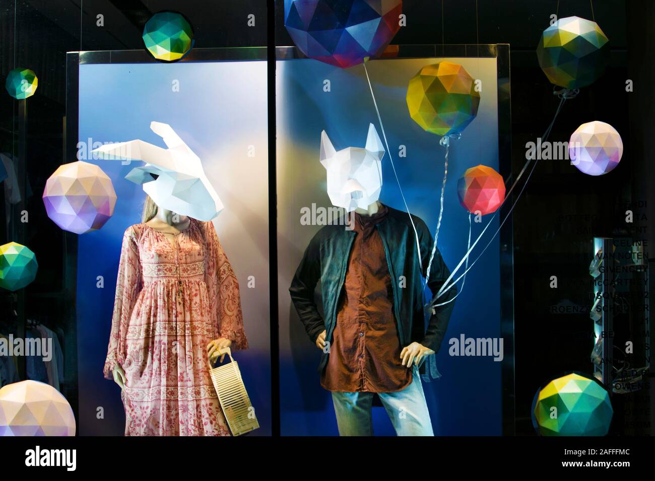 Fashion store. Dummy in a clothing store Male female mannequins in a mask casual wear. The