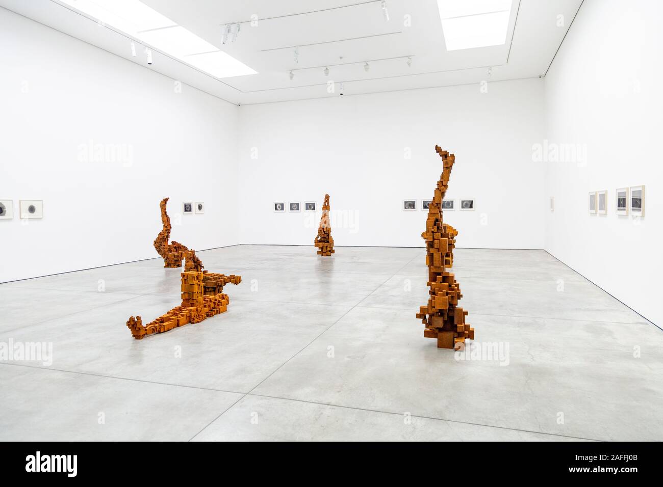 Rusted cast iron figures Antony Gormley exhibition 'In Formation' 2019 at the White Cube Mason's Yard, London, UK Stock Photo