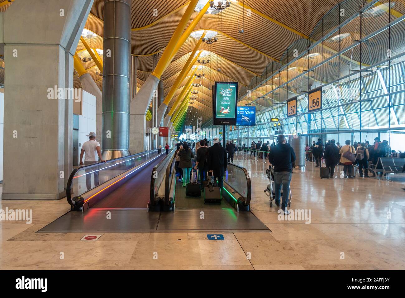 Moving walkways or travelators in Madrid-Barajas Adolfo Suárez Airport, Madrid, Spain help passengers get to their departure gates quickly. Stock Photo