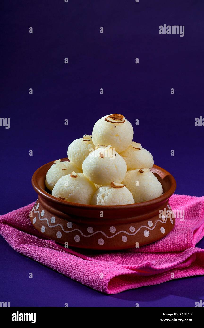 Indian Sweet or Dessert - Rasgulla, Famous Bengali sweet in clay bowl ...