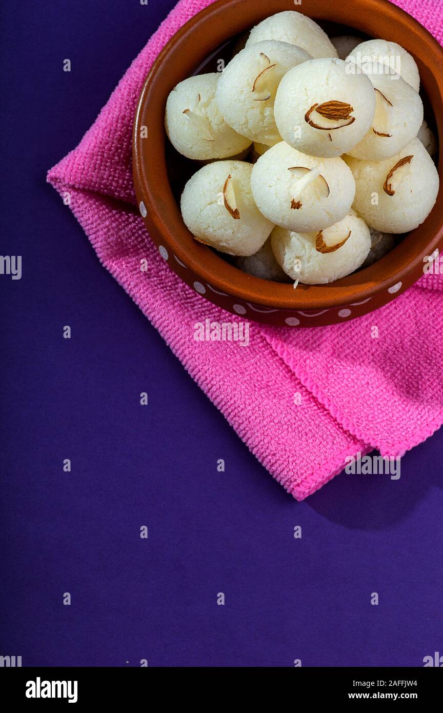 Indian Sweet or Dessert - Rasgulla, Famous Bengali sweet in clay bowl ...