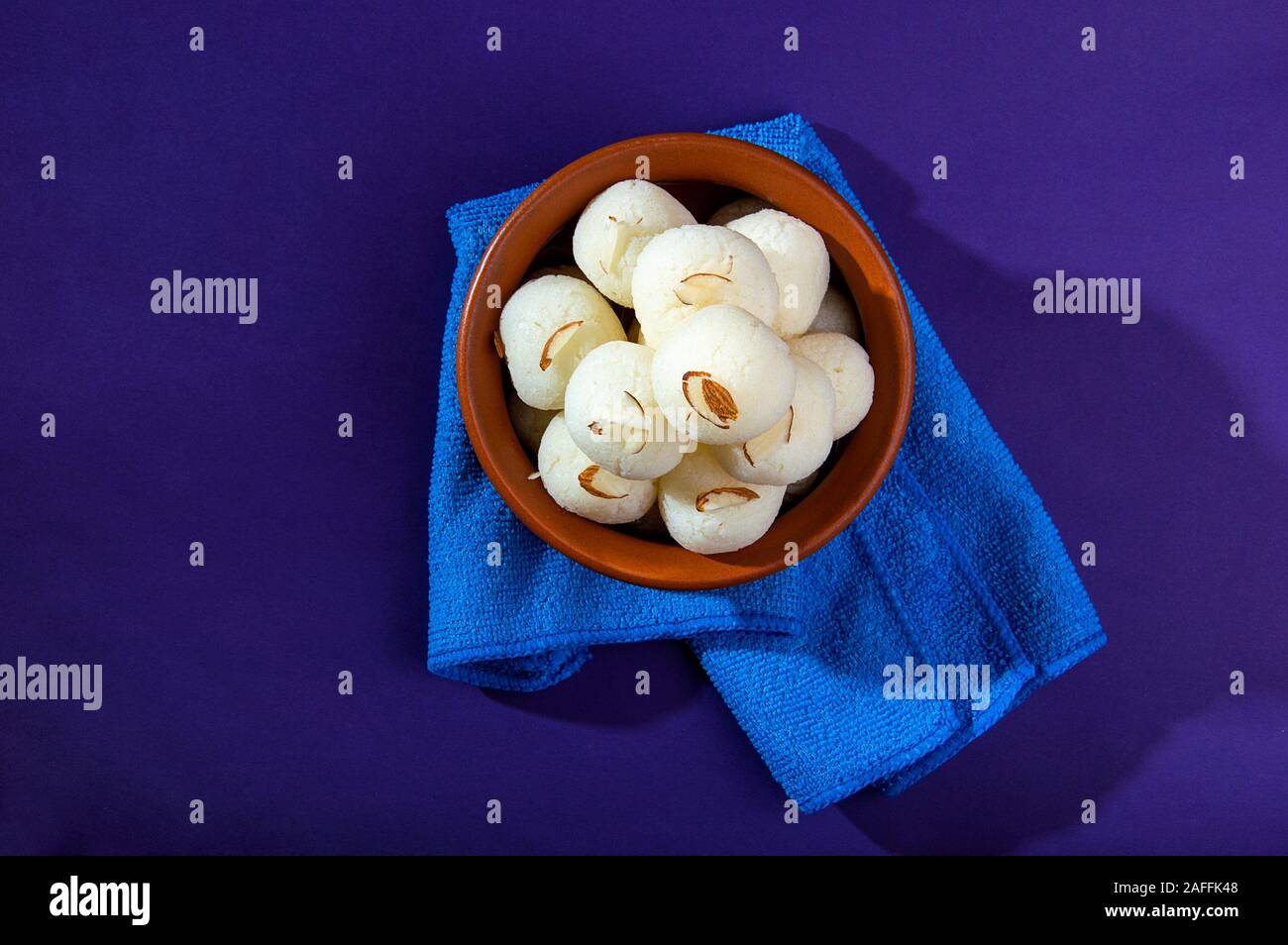 Indian Sweet or Dessert - Rasgulla, Famous Bengali sweet in clay bowl ...