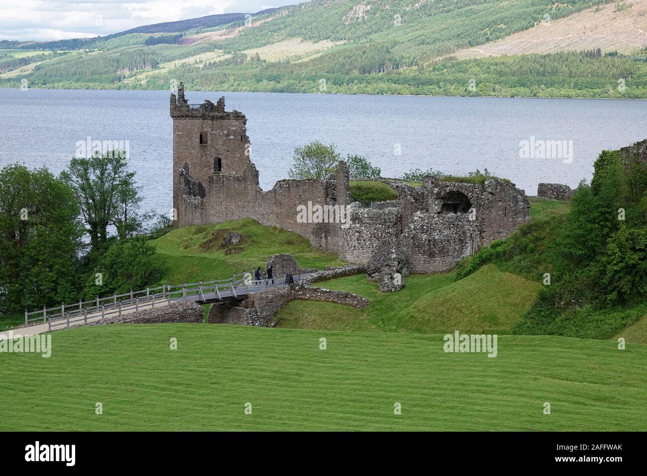 Drumnadrochit, Inverness, Scotland - June 10, 2019: Located next to the legendary lake, Loch Ness, Urquhart Castle is shown during the day. Stock Photo