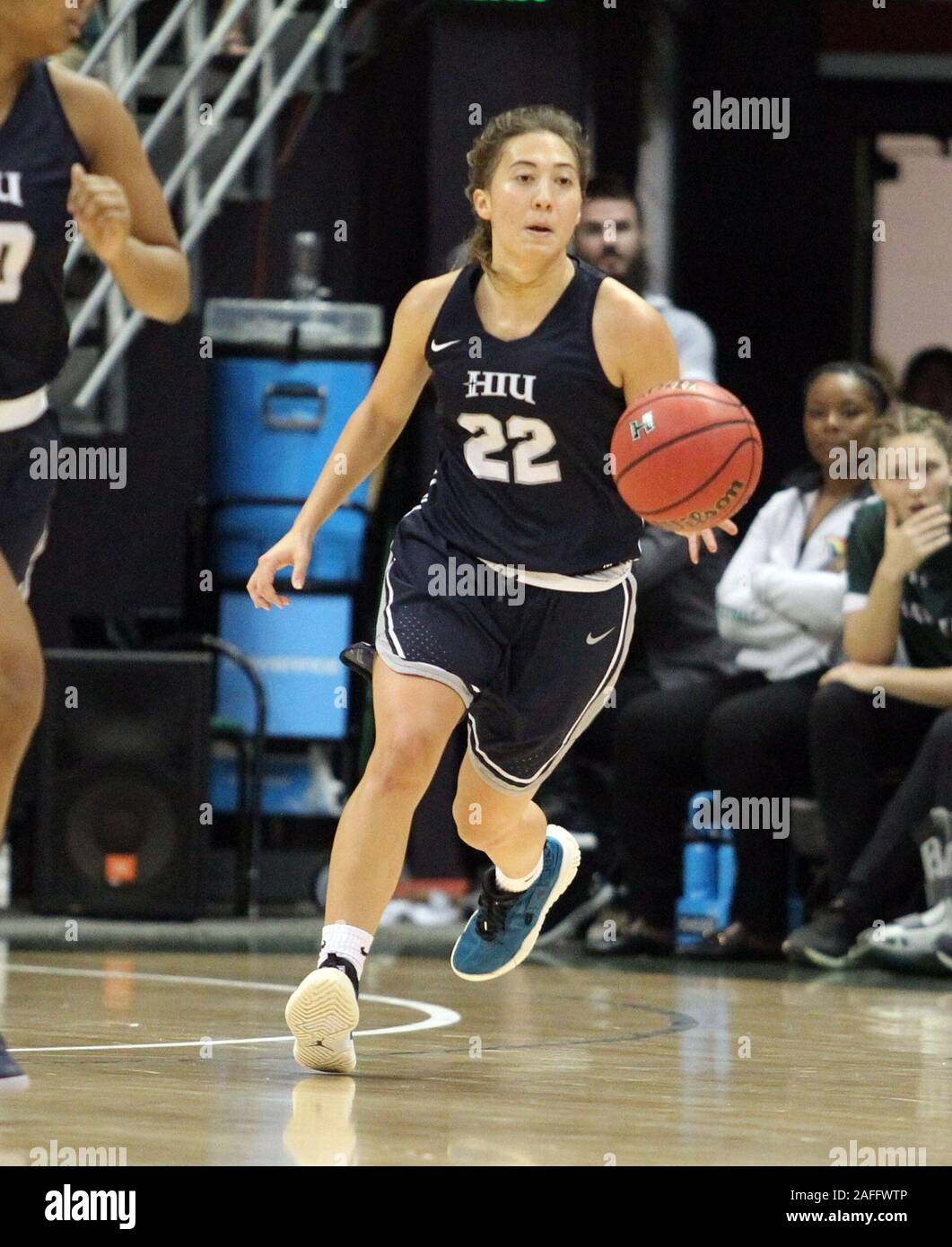 December 6, 2019 - Hope International Royals guard Ysabelle Halemano (22) dribbles the ball during a game between the Hawai'i Rainbow Wahine and the Hope International Royals at the Stan Sheriff Center in Honolulu, HI - Michael Sullivan/CSM. Stock Photo