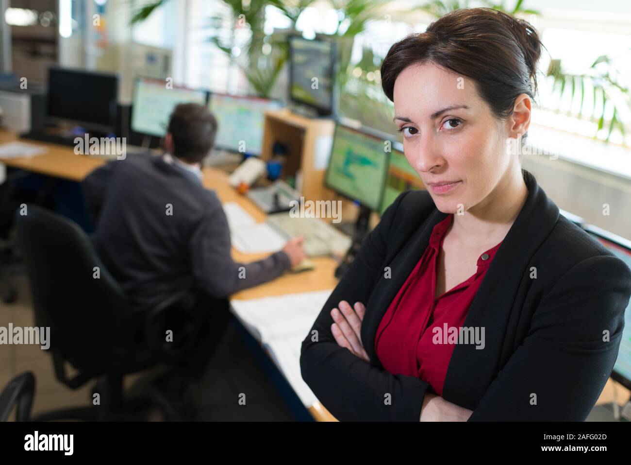 serious businesswoman with arms crossed Stock Photo - Alamy