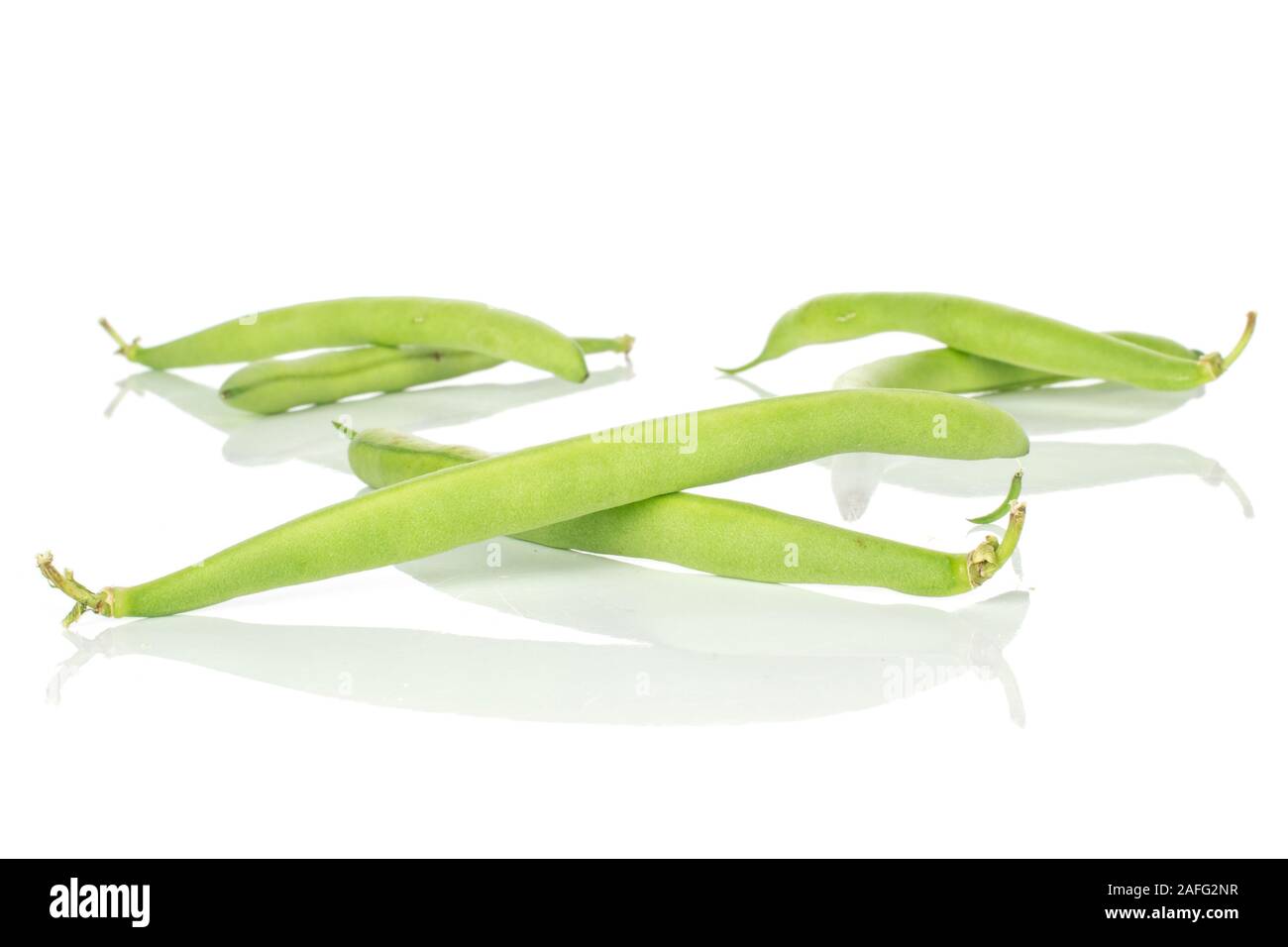 Group of six whole snap green bean isolated on white background Stock