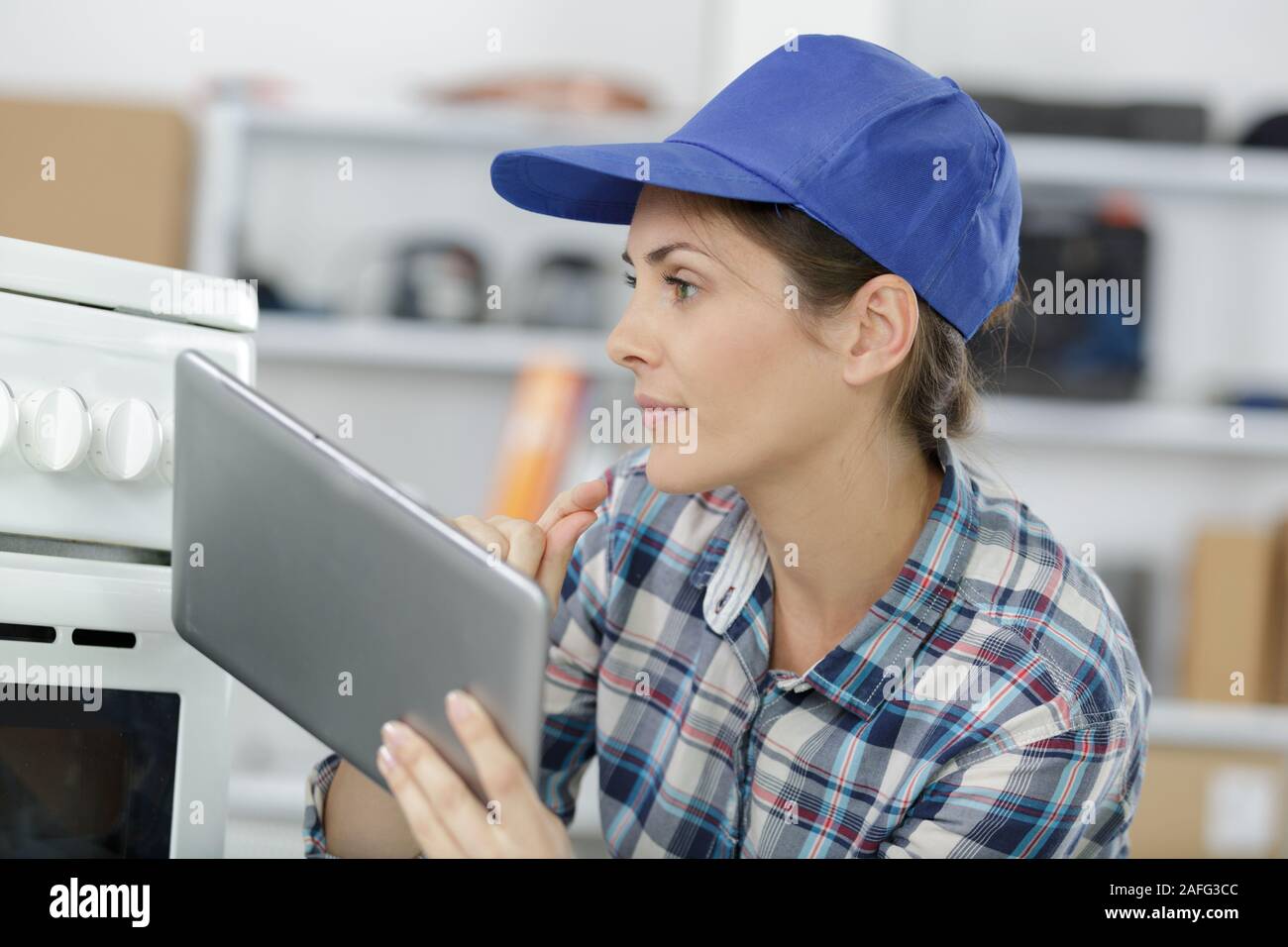 female technician using her tablet Stock Photo
