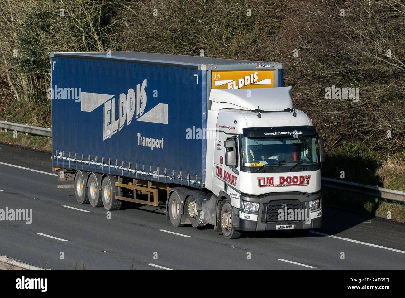TIM DOODY Elddis Transport; Haulage delivery trucks, lorry, transportation, truck, cargo carrier, vehicle, commercial industry, M6 at Lancaster, UK Stock Photo