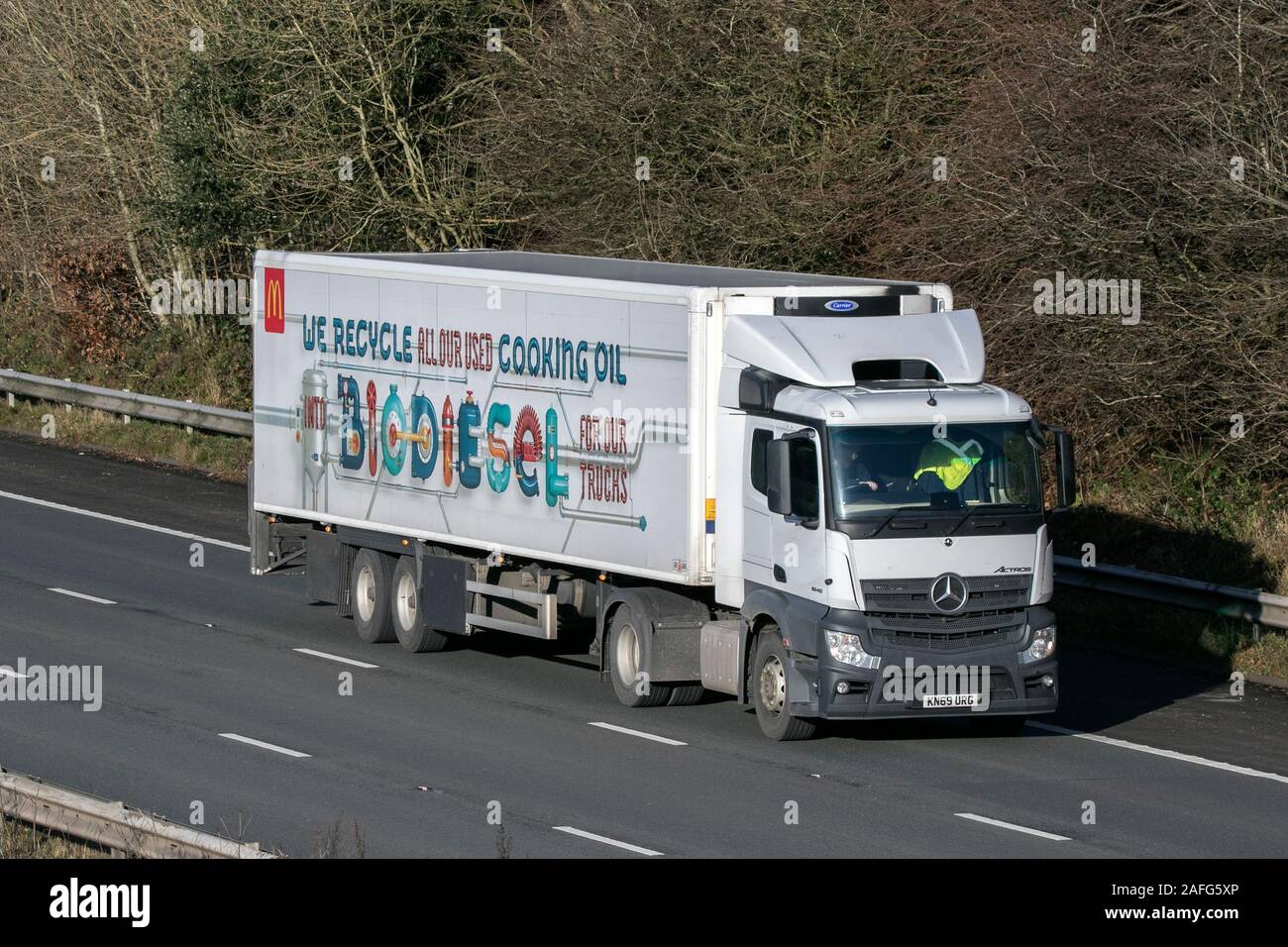 McDonalds BioDiesel Haulage delivery trucks, lorry, transportation, truck, cargo carrier, vehicle, commercial transport, industry, M6 at Lancaster, UK Stock Photo