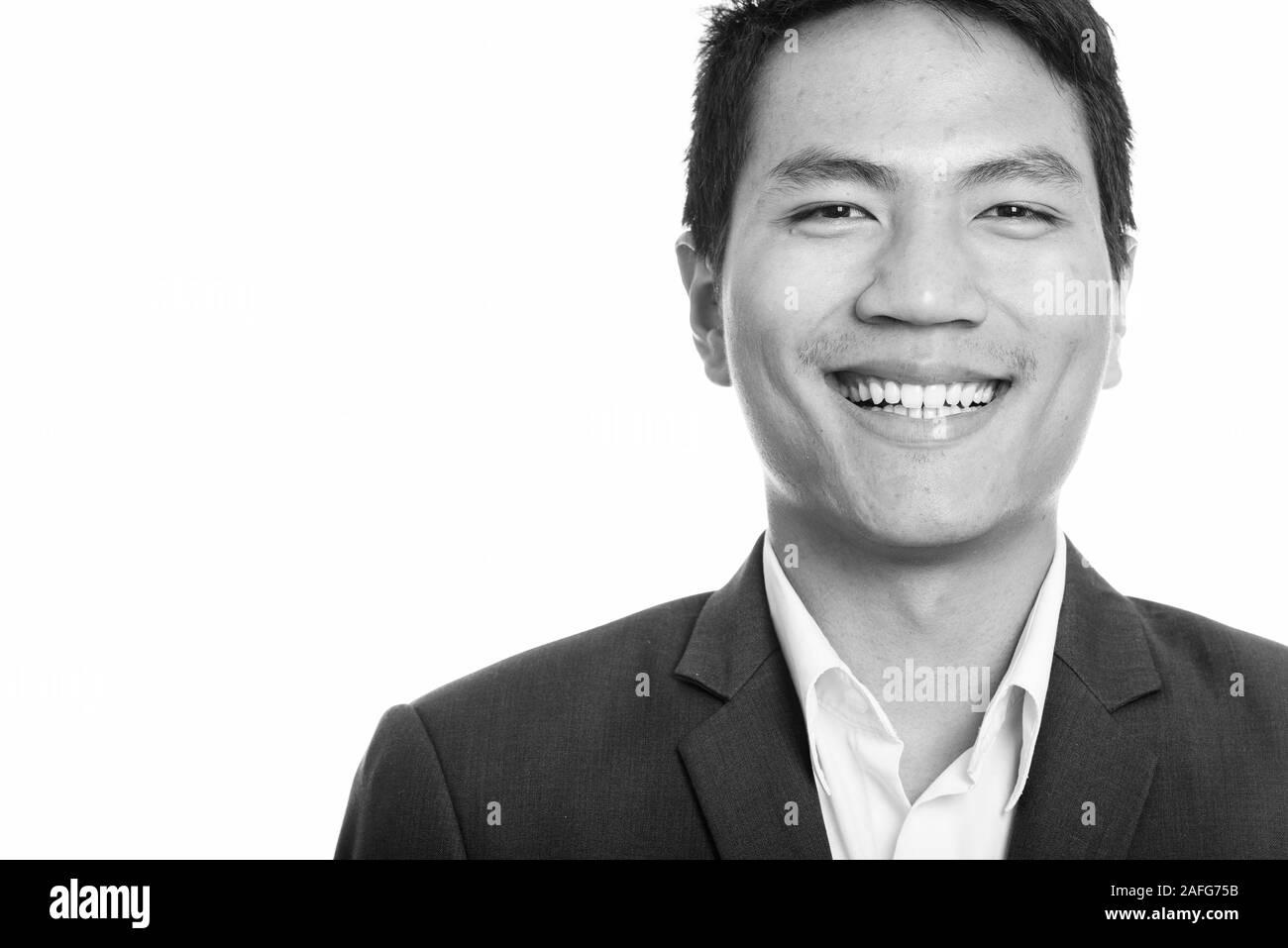 Asian man 20s smiling portrait Black and White Stock Photos & Images ...