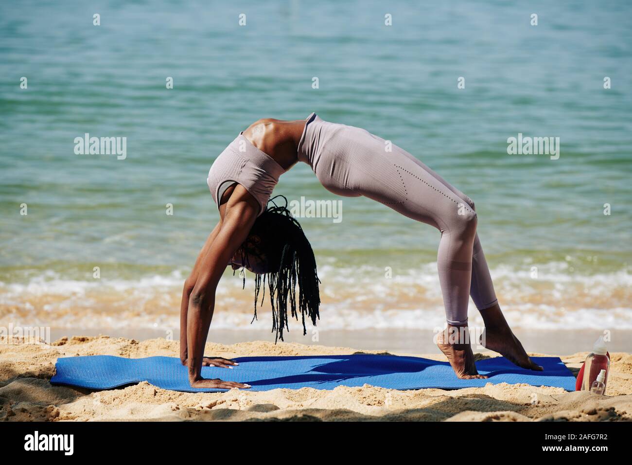 Girl Stretching On Beach Stock Photo 1635160
