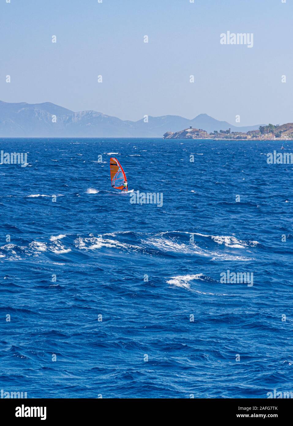 Windsurfer off the coast of Kos Island, Dodecanese, Greece Stock Photo