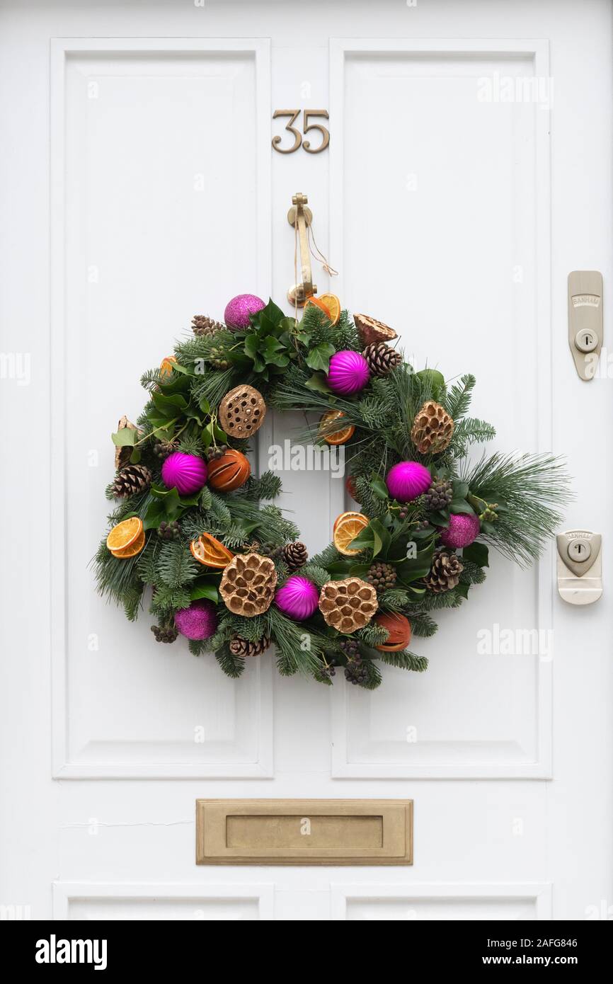 Christmas wreath on a grey door. London, England Stock Photo Alamy