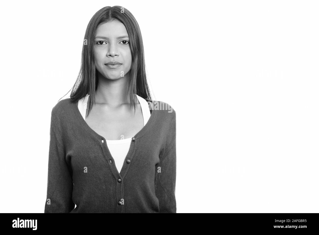 Studio shot of young beautiful Brazilian woman Stock Photo