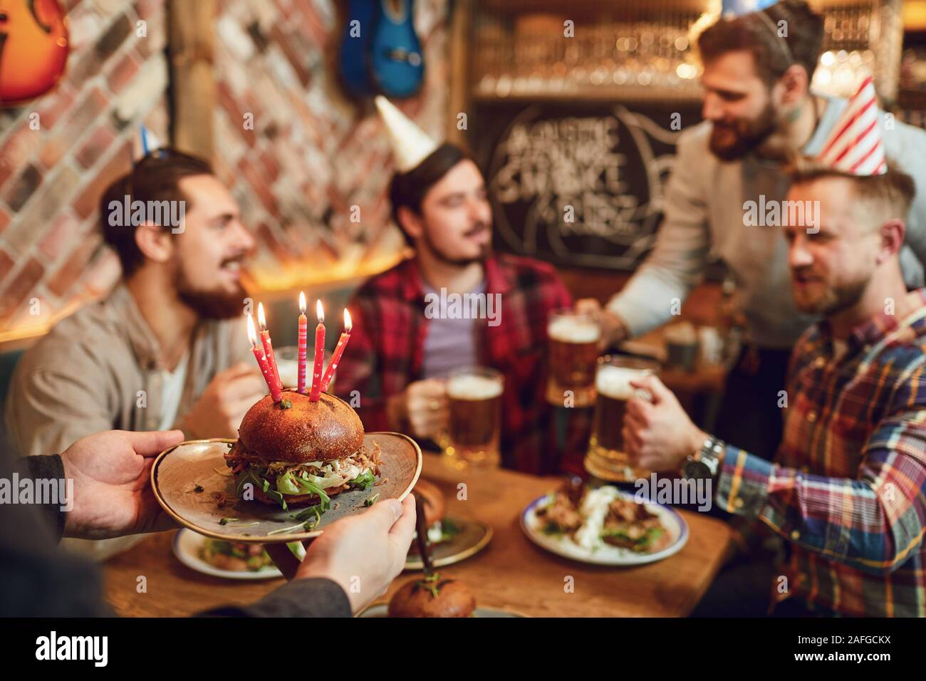 Friends male celebrate a birthday party Stock Photo Alamy