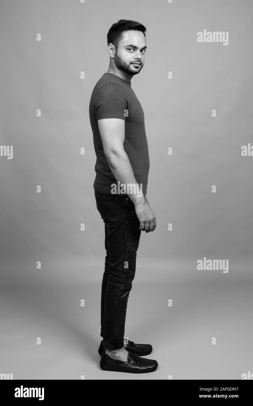 Indian guy full body studio Black and White Stock Photos & Images - Alamy