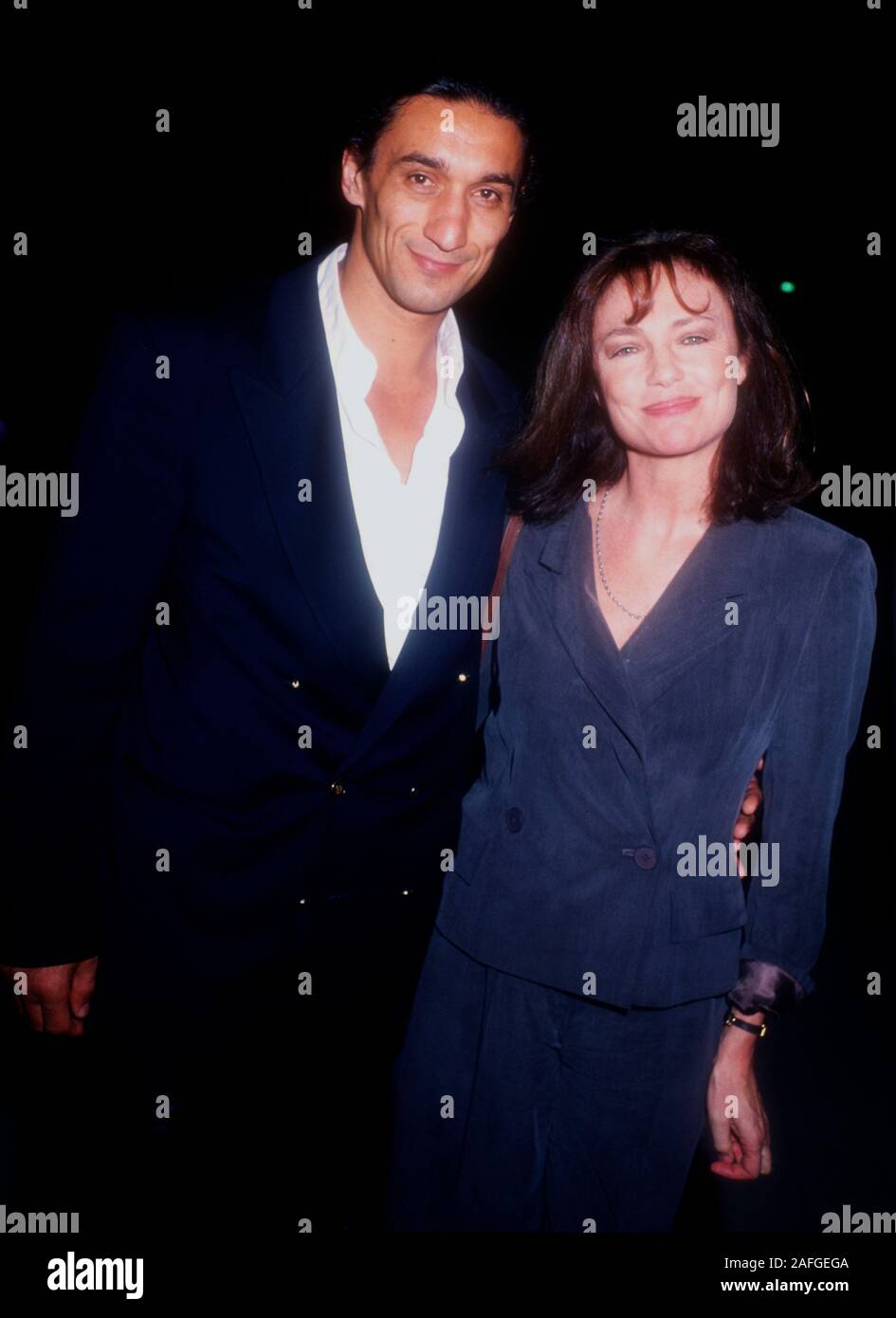 Beverly Hills, California, USA 3rd April 1995 Emin Boztepe and actress Jacqueline  Bisset attend New Line Cinema's 'Don Juan DeMarco' Premiere on April 3, 1995 at the Academy Theatre in Beverly Hills, California, USA. Photo by Barry King/Alamy Stock Photo Stock Photo