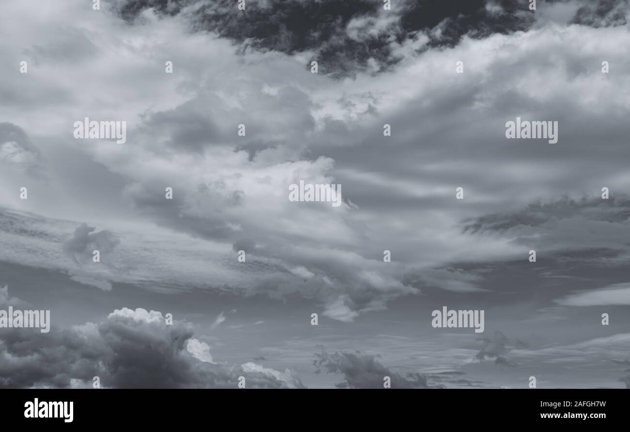Gray and white cloud abstract background. Sad, dead, hopeless, and despair background. Thunder and storm concept. Gray sky and fluffy clouds. Unlucky Stock Photo