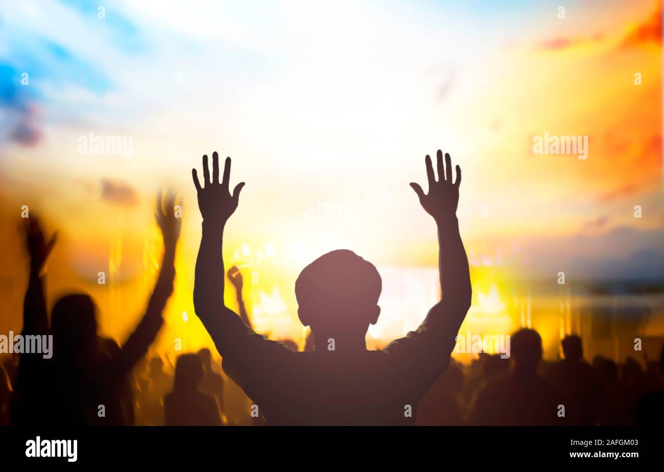Christian worship with raised hand,music concert Stock Photo