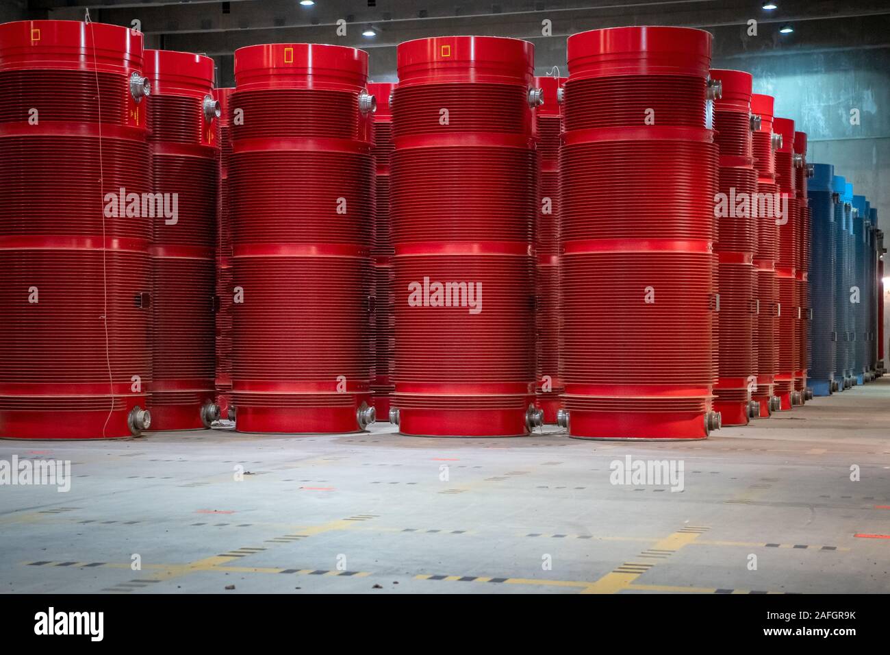 Gorleben, Germany. 11th Dec, 2019. Containers with high-level radioactive waste are in interim storage. The Gorleben nuclear waste storage facility is an interim storage facility for spent fuel elements and high-level radioactive waste. To date, 13 Castor transports with highly radioactive material have reached the transport container warehouse between 1995 and 2011. Until a repository has been found, the nuclear waste is to be temporarily stored there. Credit: Sina Schuldt/dpa/Alamy Live News Stock Photo