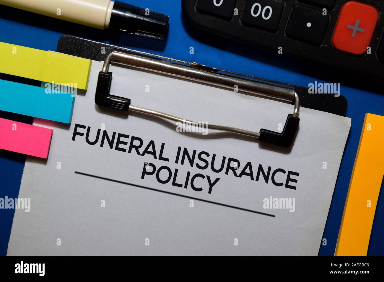 Funeral Insurance Policy write on document isolated blue background
