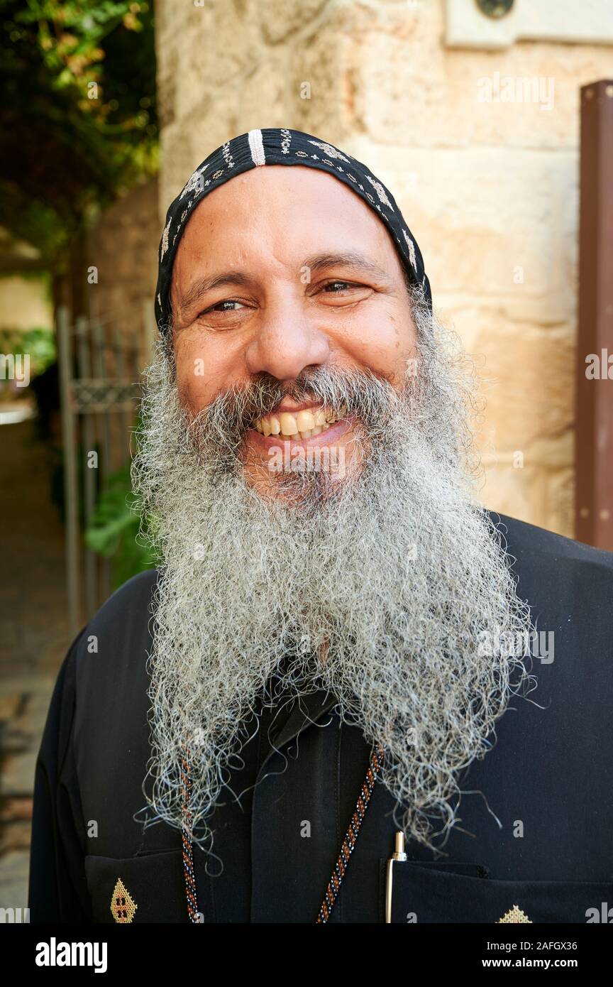 Jerusalem Israel. Portrait of a smiling priest in the old city Stock Photo