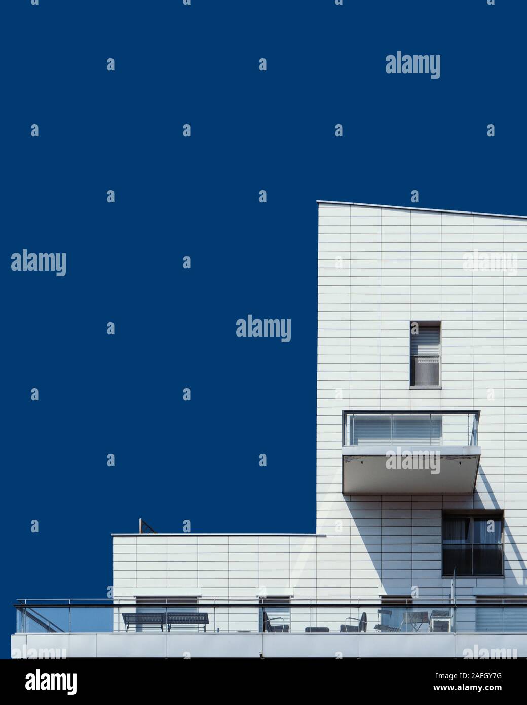 Vertical low angle shot of a beautiful white building under the blue ...