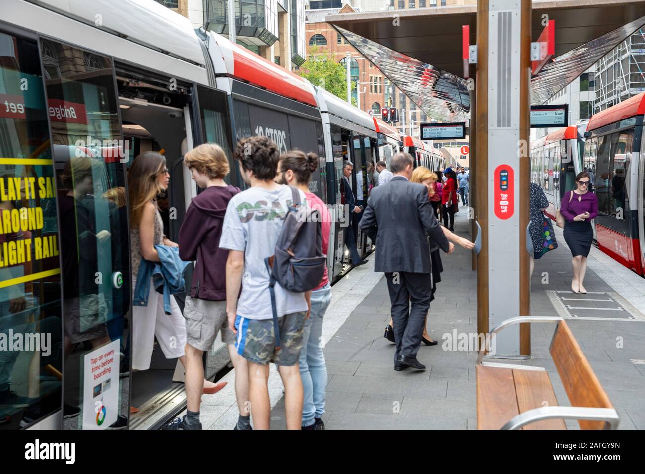 Sydney light rail tram, passengers wait for the light rail train on its