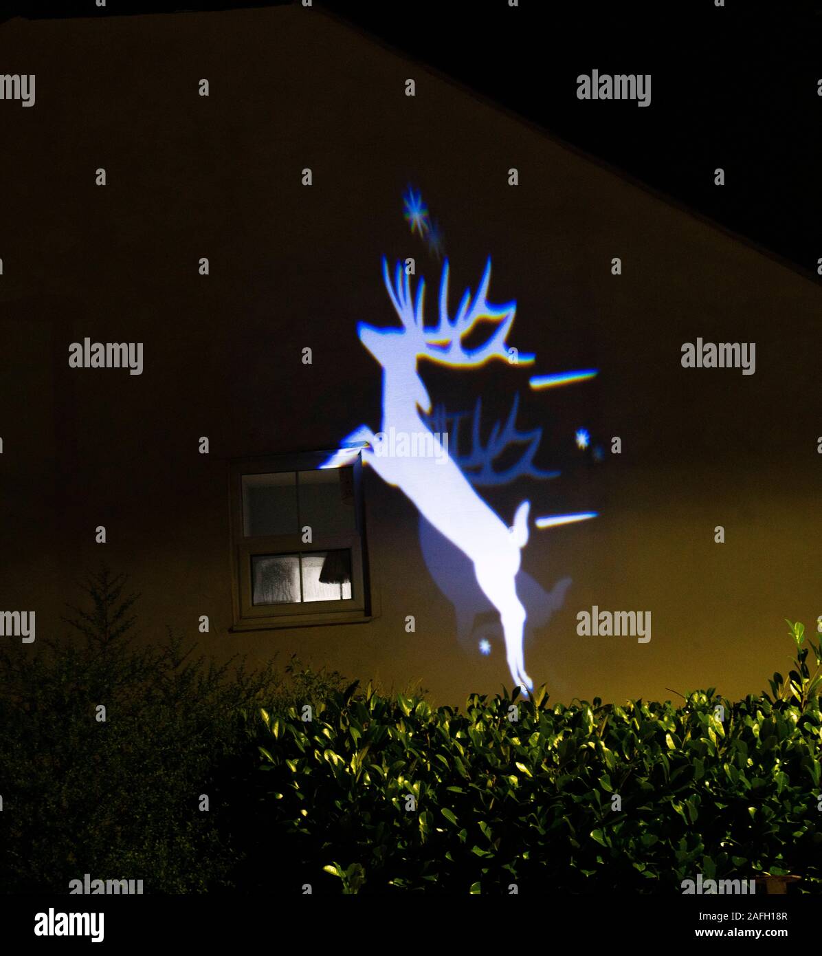 Christmas lights projected onto the side of a house in Bromley, London Stock Photo Alamy