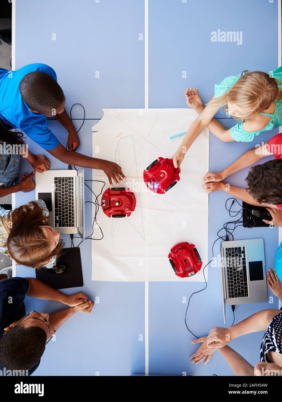 Overhead View Of Students In After School Computer Coding Class ...