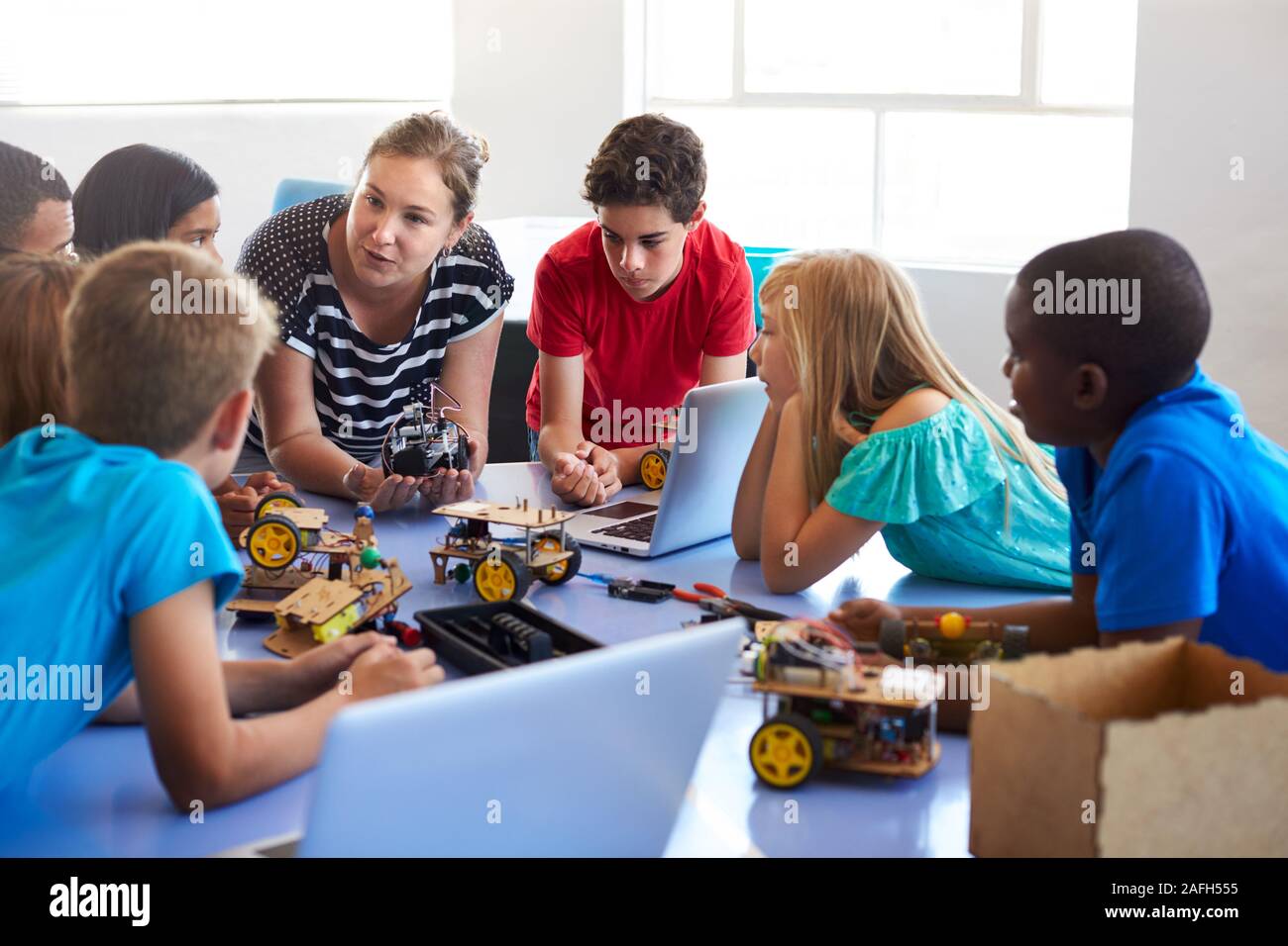 Students In After School Computer Coding Class Building And Learning To ...