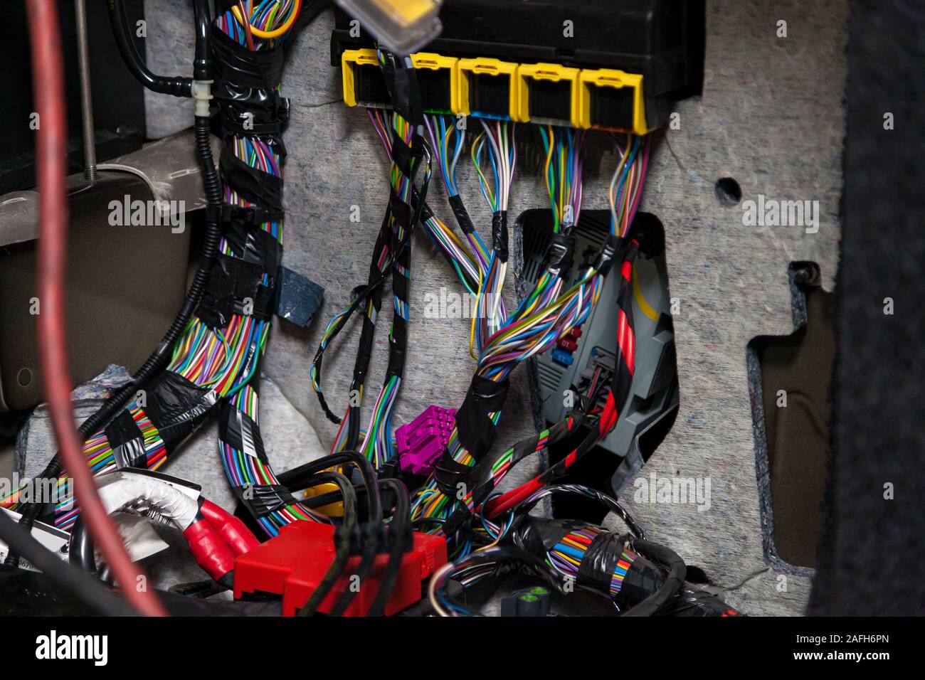 Large wide cable with multicolored red and green wires and connectors