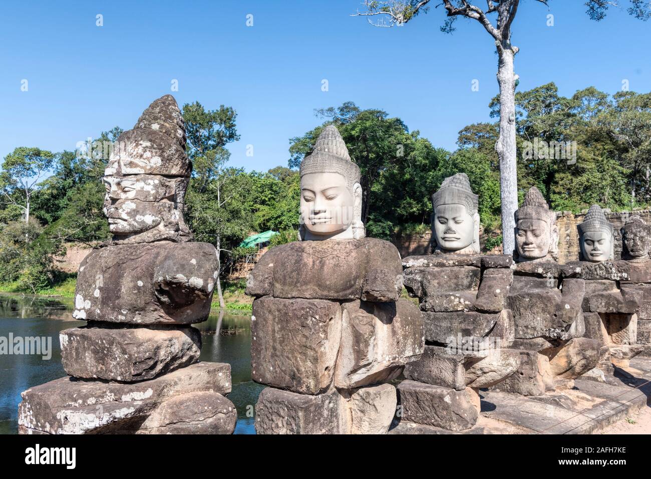 Angkor Thom South Gate Entrance, Siem Reap, Cambodia close up detail buddhist carvings statues of the gods on the bridge Stock Photo